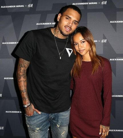 Royalty Brown's father, Chris Brown with his then-lover Karrueche Tran.